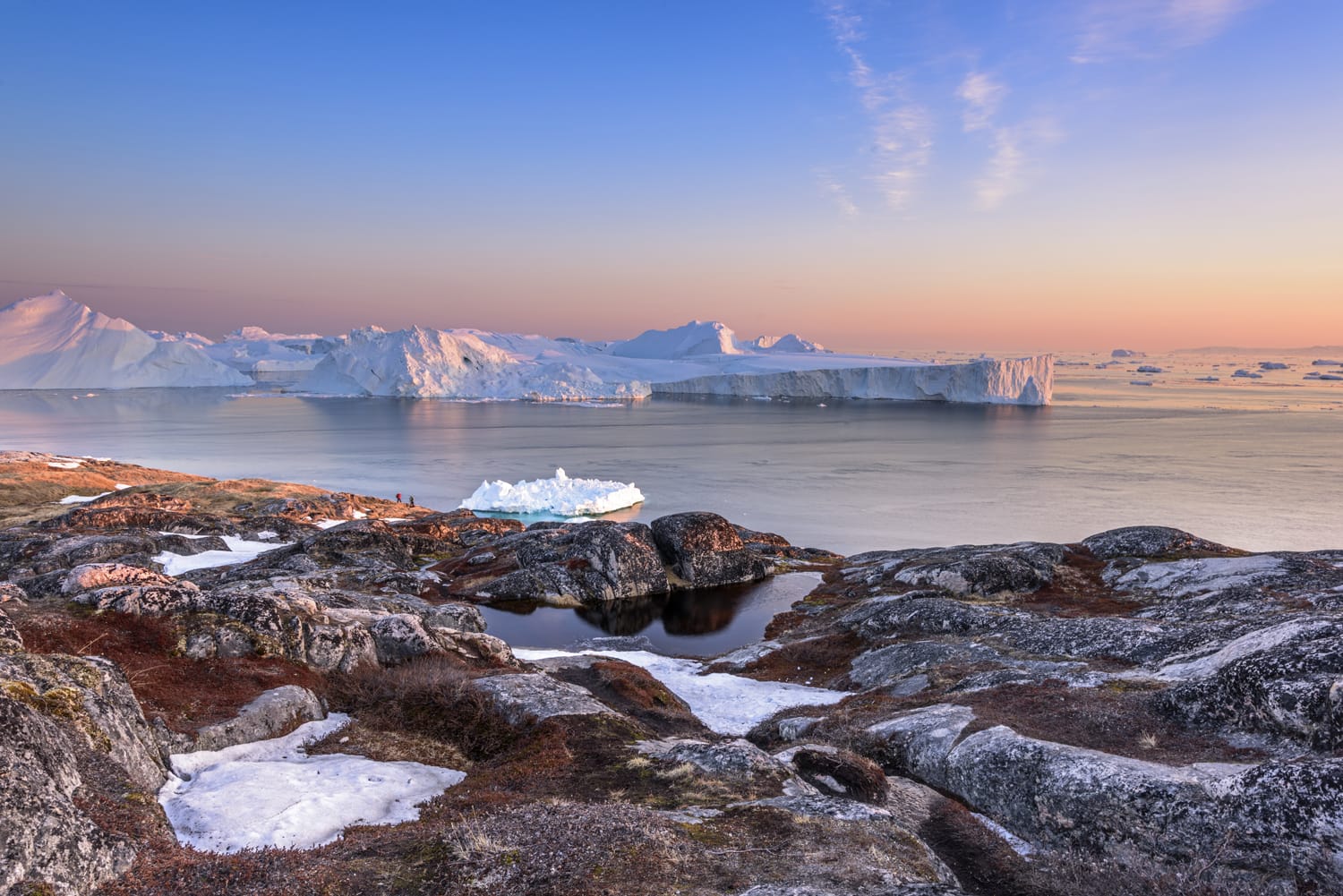 icebergs on the arctic ocean with sunset in Ilulissat, Greenland