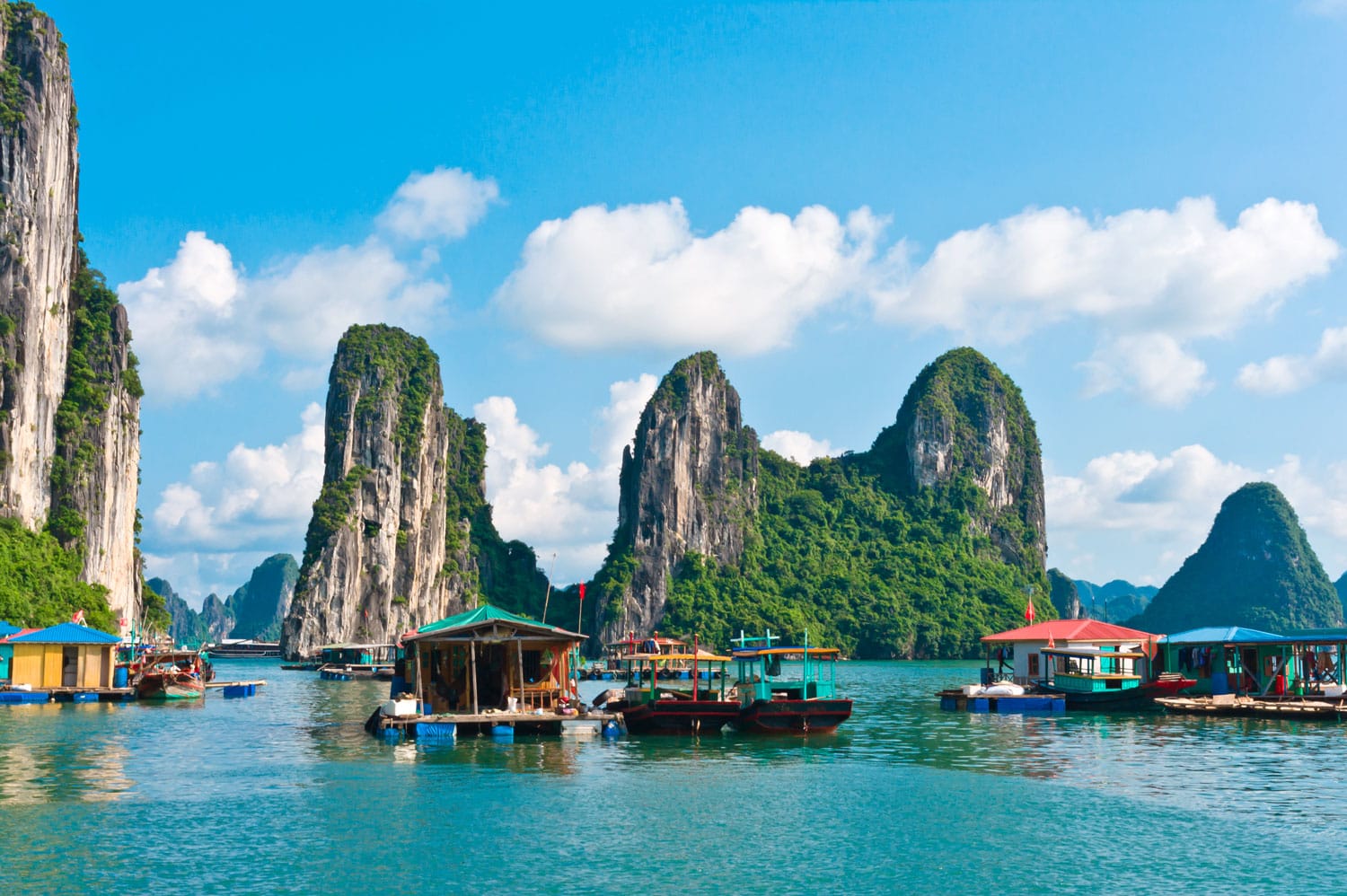 Floating village and rock islands in Halong Bay, Vietnam, Southeast Asia