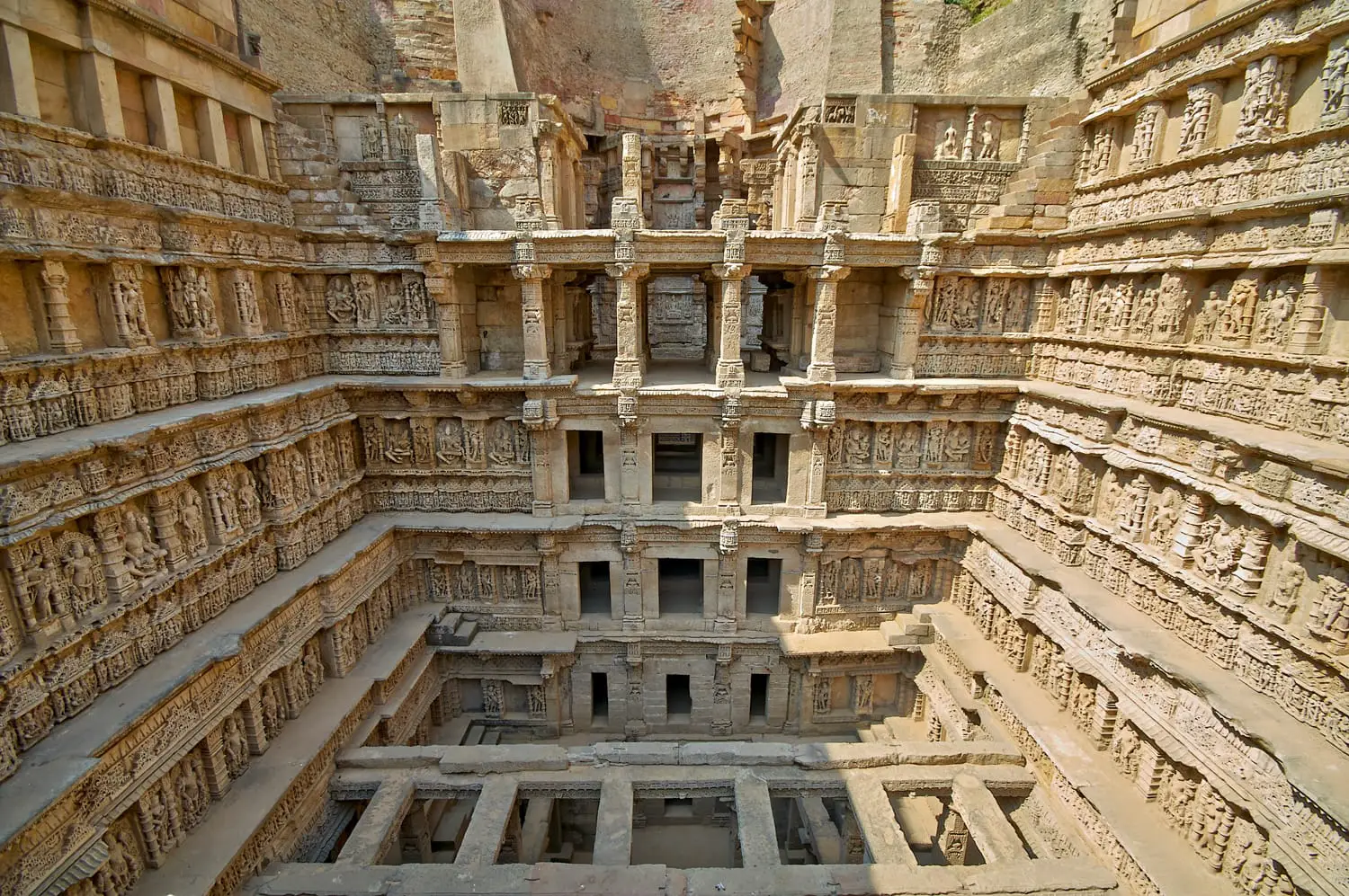Ornate stone carved walls lining the 11th century Rav-Ki-Vav stepwell at Patan, Gujarat, India. Selected as a UNESCO world Heritage Site
