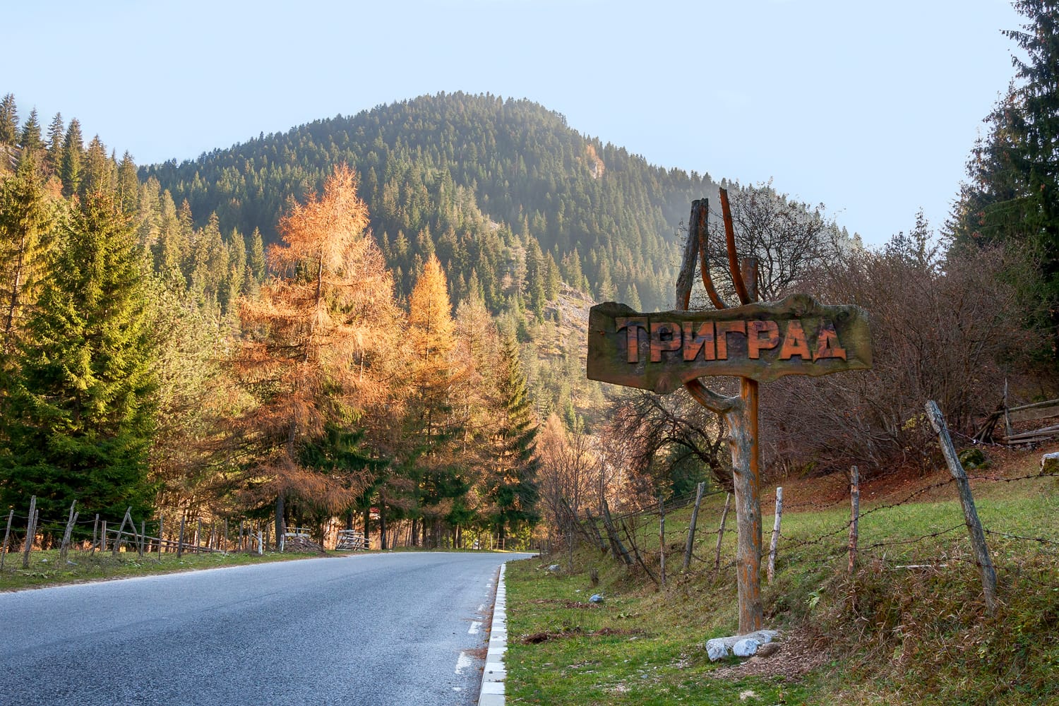 The sign of village of Trigrad - popular tourist destination in Rhodope mountains, Bulgaria