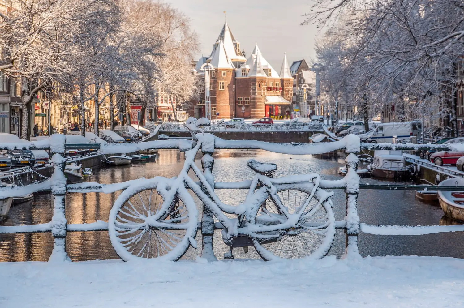 Bicycles under the Snow, view on Nieuwmarkt, Amsterdam Channels