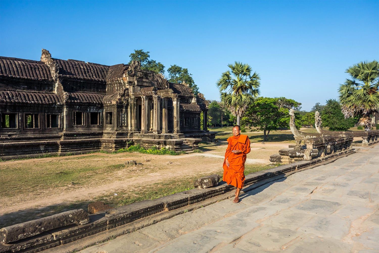 Monk walking at Angkor Wat in Cambodia
