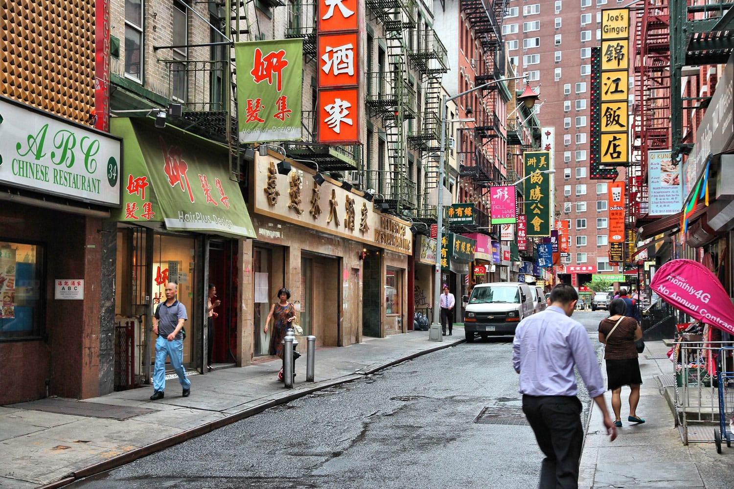 People walking in Chinatown in New York City.