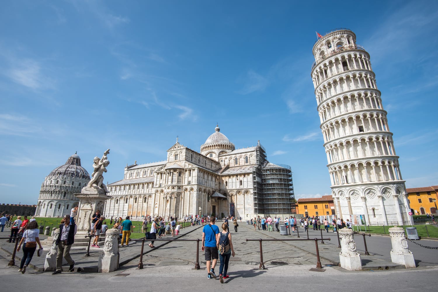 Piazza dei Miracoli complex with the leaning tower of Pisa in front, Italy