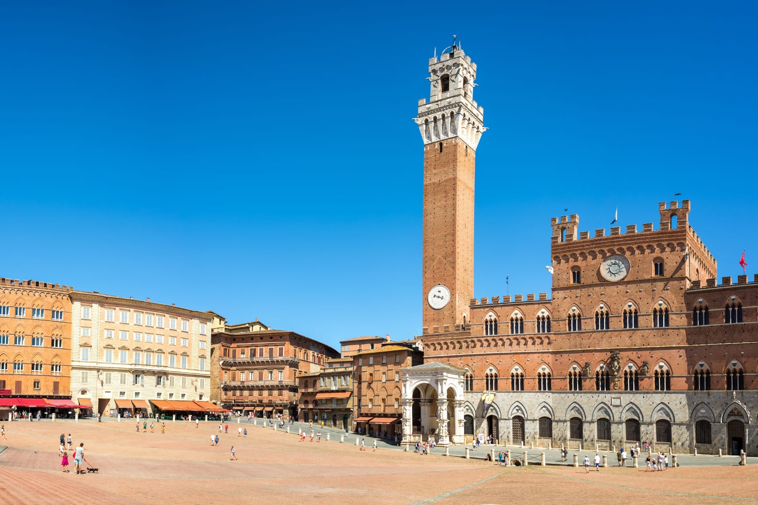 Panorama of Piazza del Campo (Campo square), Palazzo Publico and Torre del Mangia (Mangia tower) in Siena, Tuscany, Italy
