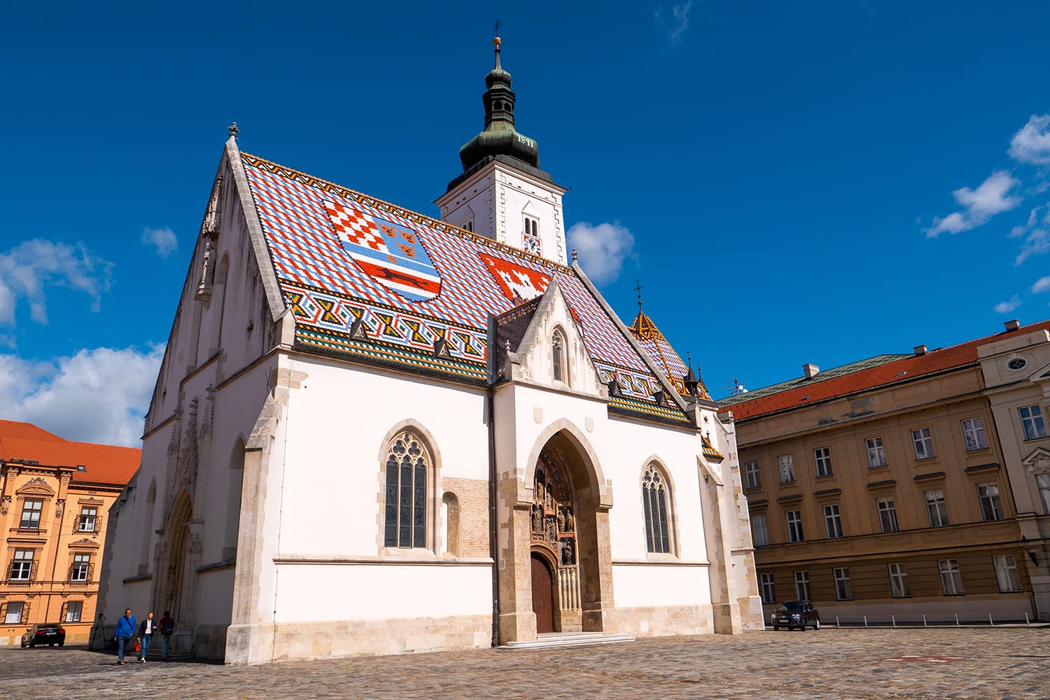 Tourists visits St. Mark's Church in Zagreb, Croatia