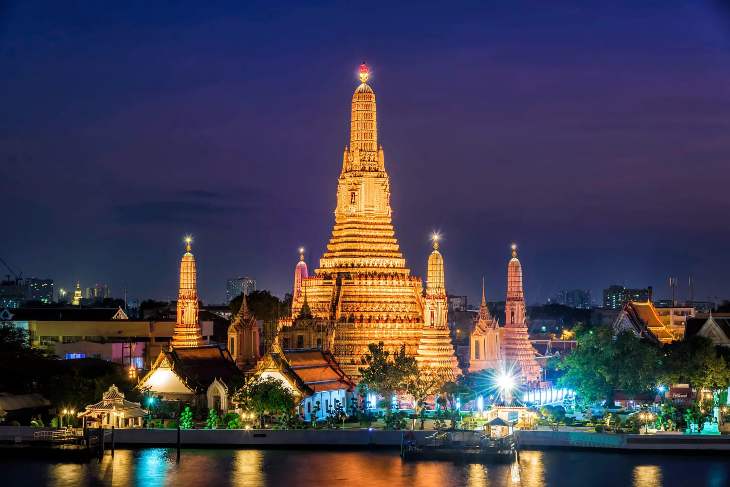 Wat Arun Temple at twilight in Bangkok Thailand .