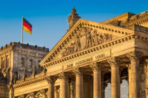 Close-up view of famous Reichstag building, seat of the German Parliament (Deutscher Bundestag), in beautiful golden evening light at sunset, Berlin Mitte district, Germany