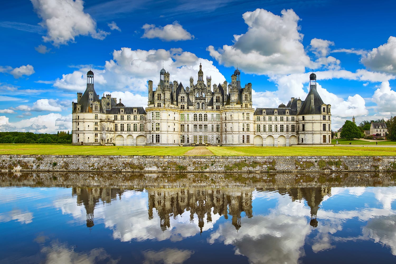 Chateau de Chambord, royal medieval french castle and reflection. Loire Valley, France