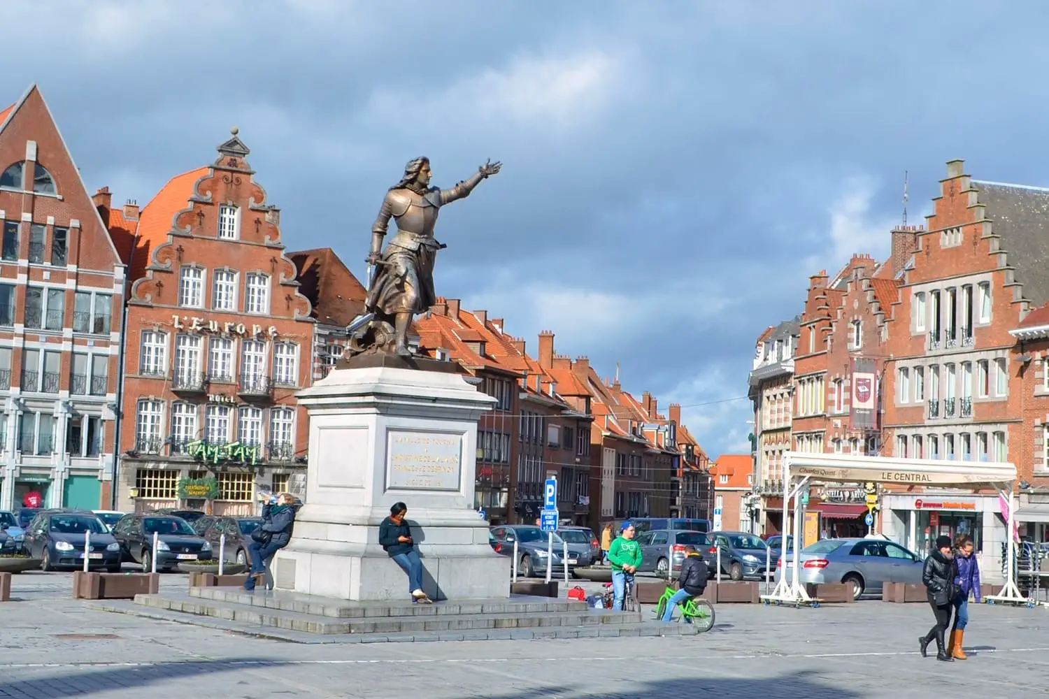 View of the people passing grote markt - main square in Tournai/Doornik, Belgium