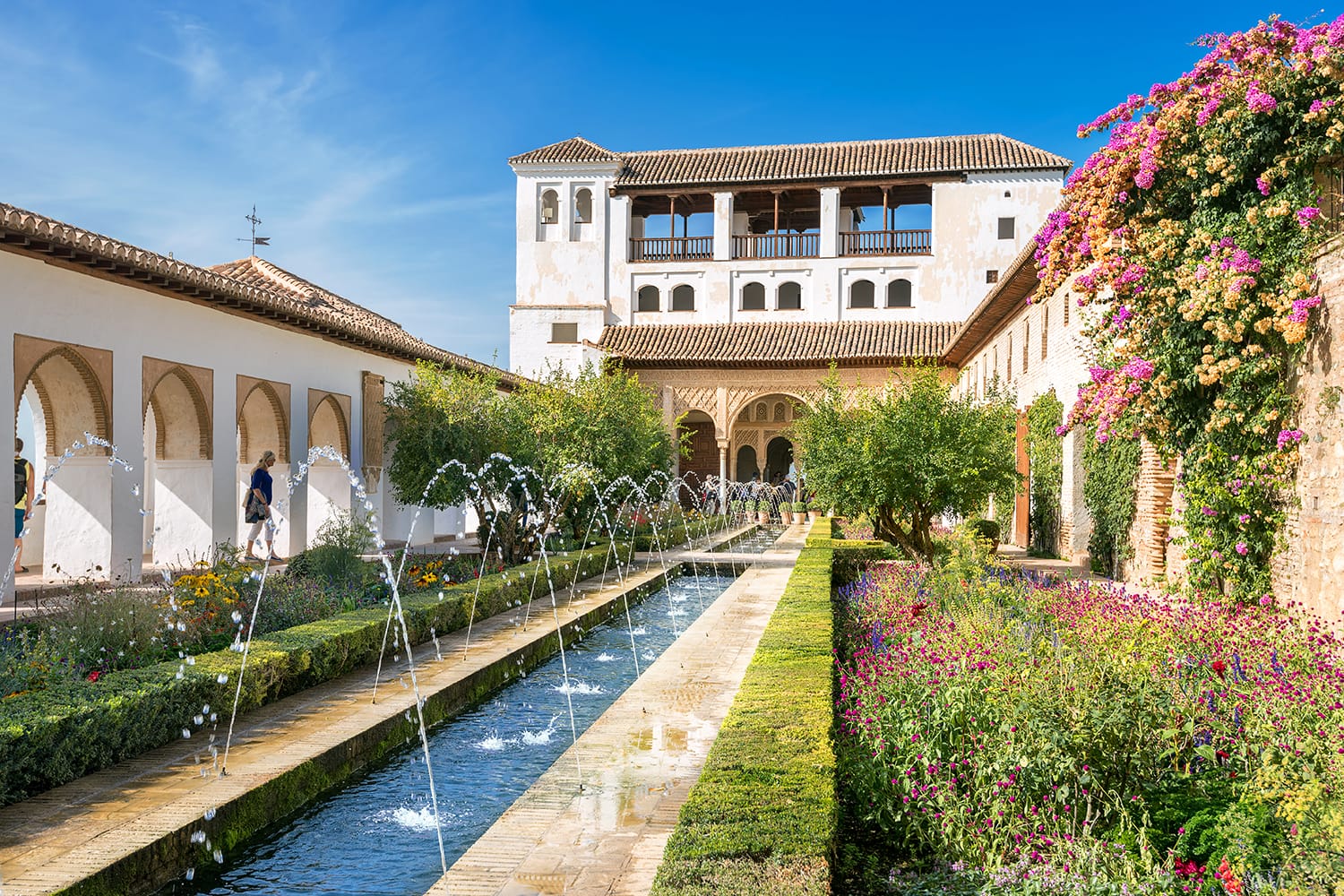 View of Generalife courtyard with fountain in Alhambra palace. Granada, Andalusia, Spain