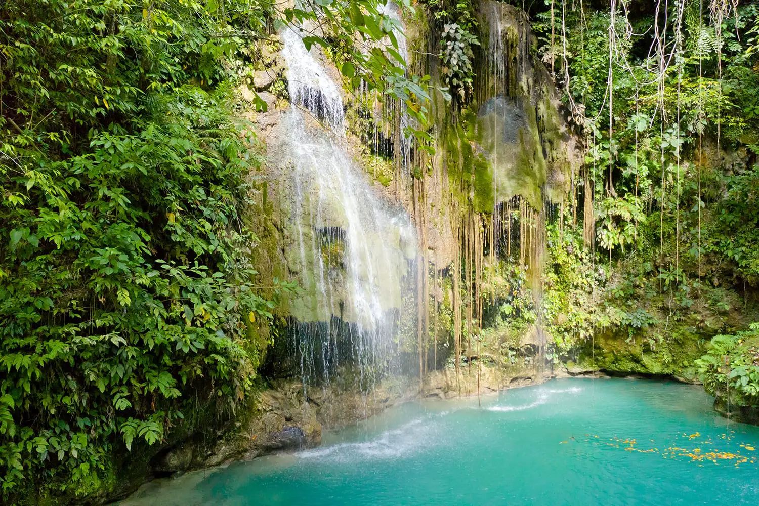 Cambais waterfalls in a mountain gorge in the tropical jungle, Philippines, Cebu
