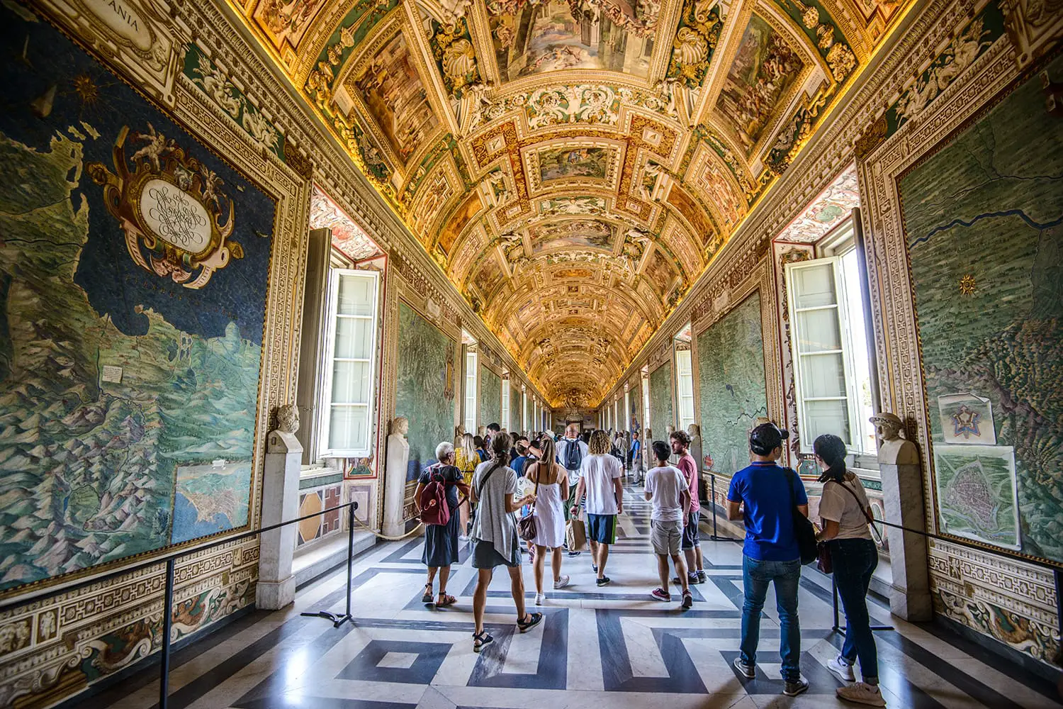 Panorama of people visiting and enjoying the Vatican Museum in Rome, Italy