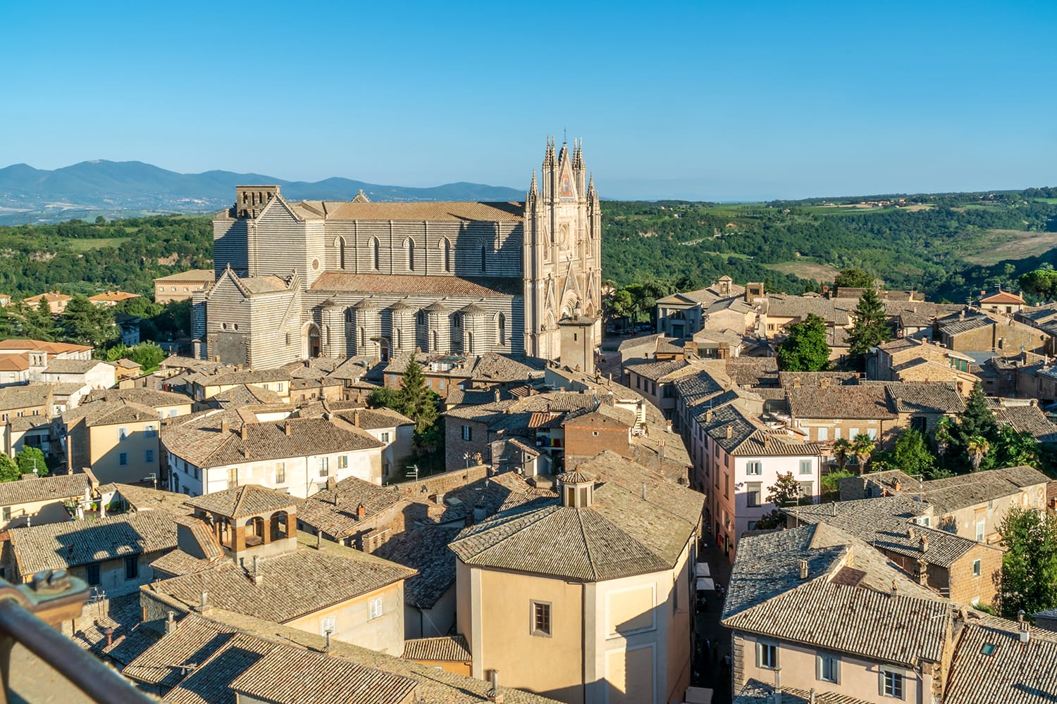 View on historic Duomo di Orvieto, Orvieto Cathedral from the Torre del Moro tower Italy