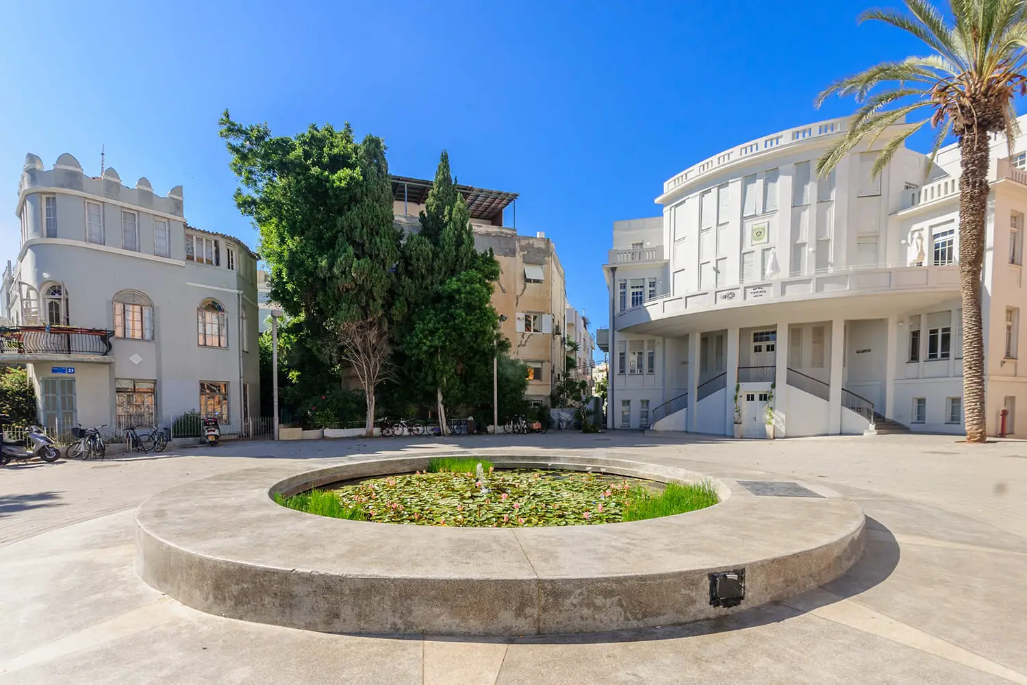 Scene of the Bialik Square, with visitors, in Tel Aviv, Israel. The Bialik Square was the home for the first townhall of Tel-Aviv and is an example of the Bauhaus architecture