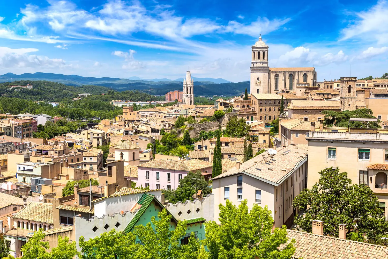 Panoramic aerial view of Girona and cathedral in a beautiful summer day, Catalonia, Spain