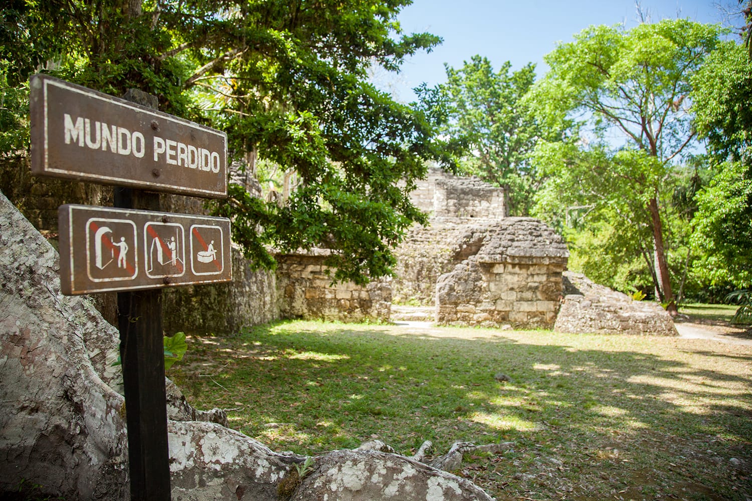Sign at the entrance to the complex of astronomic conmmemoration known as Plaza of the Great Pyramid or Lost World (Mundo Perdido) in Tikal, Guatemala.