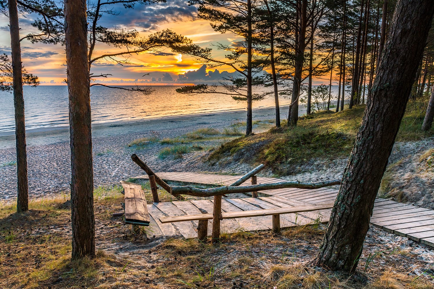 Wooden footpath leading to a shore of the Baltic Sea, Jurmala, Latvia