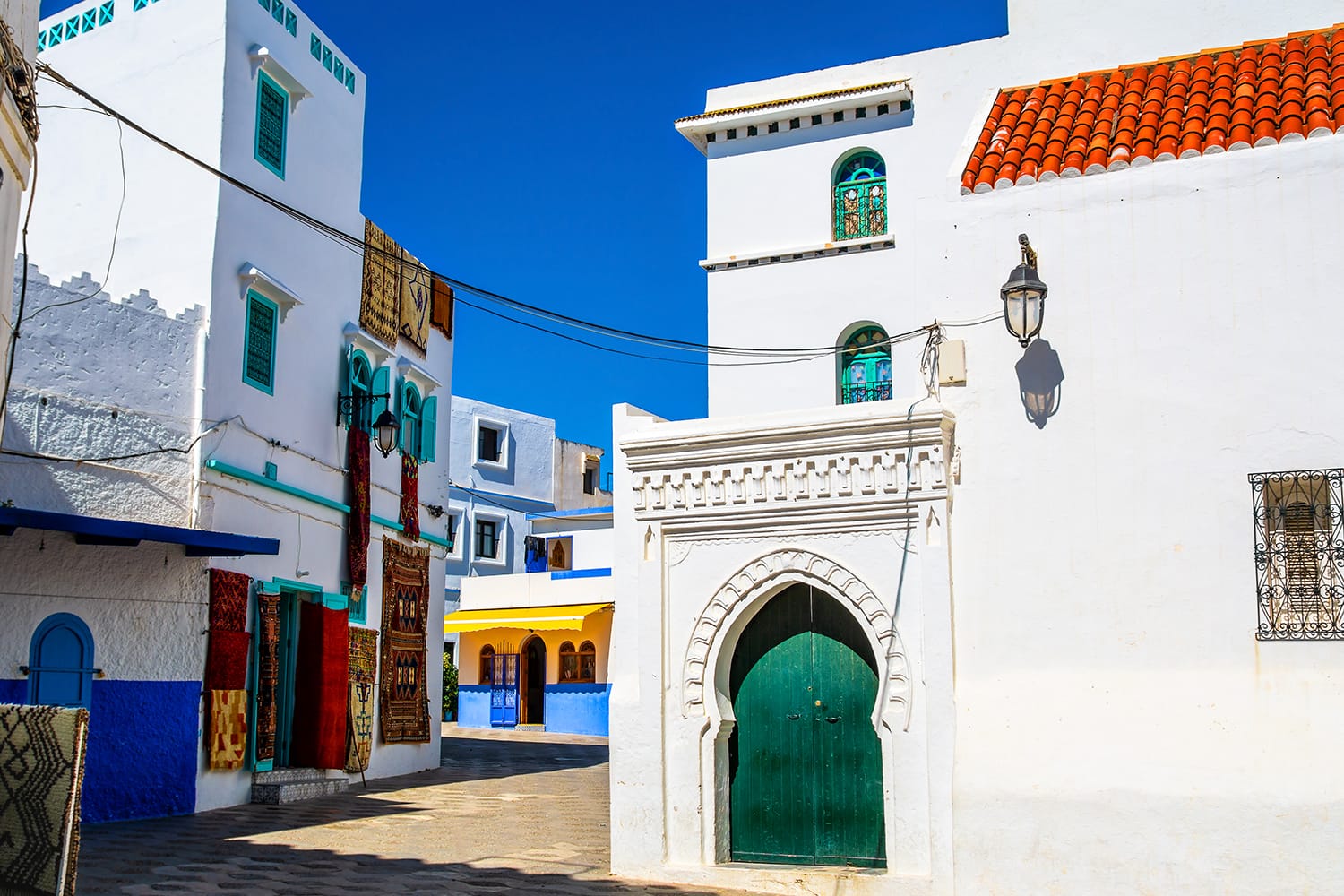 Beautiful view of street with typical arabic architecture in Asilah, North Morocco, Africa.