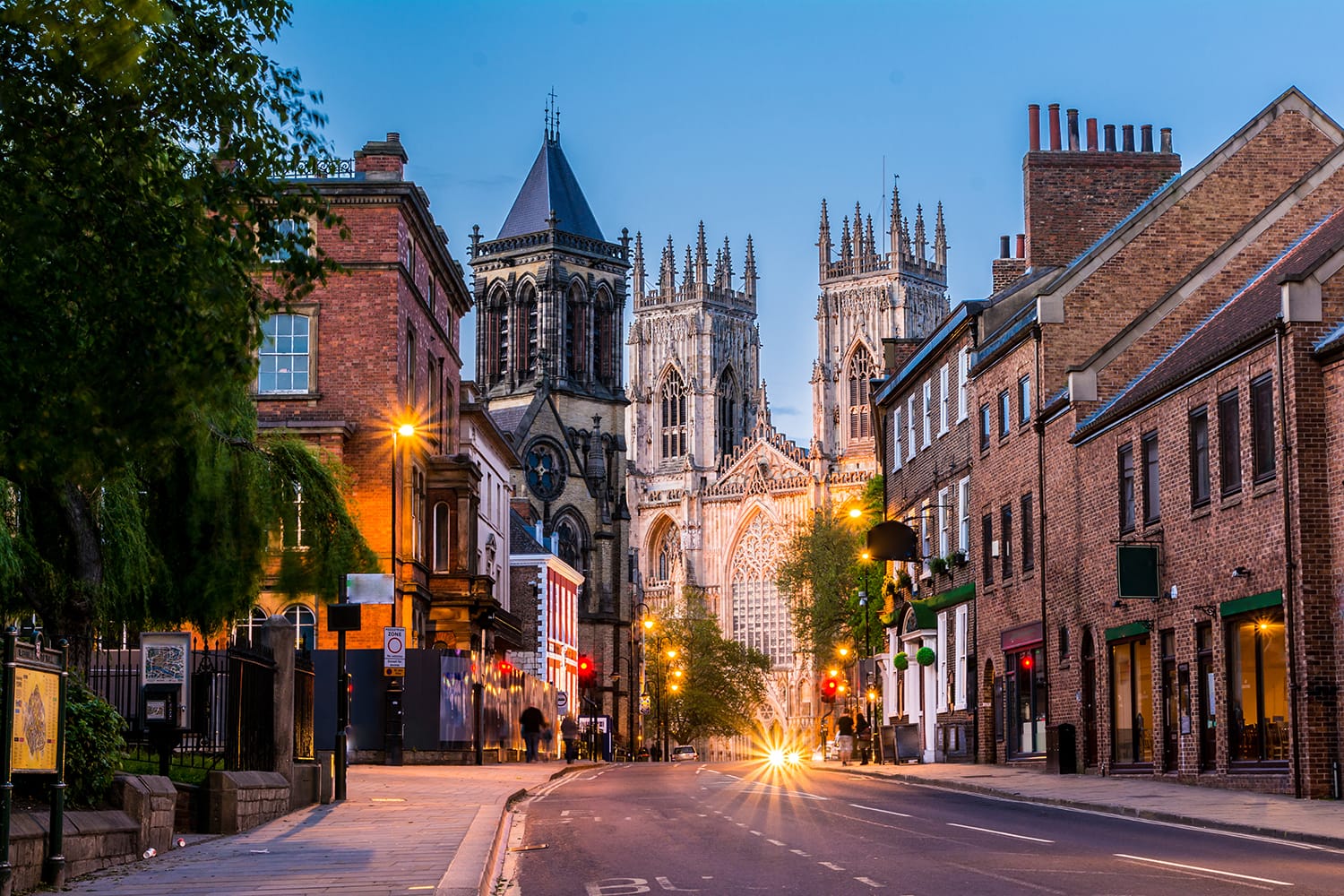 York, evening cityscape view from the street with York Minster in the background. England, United Kingdom