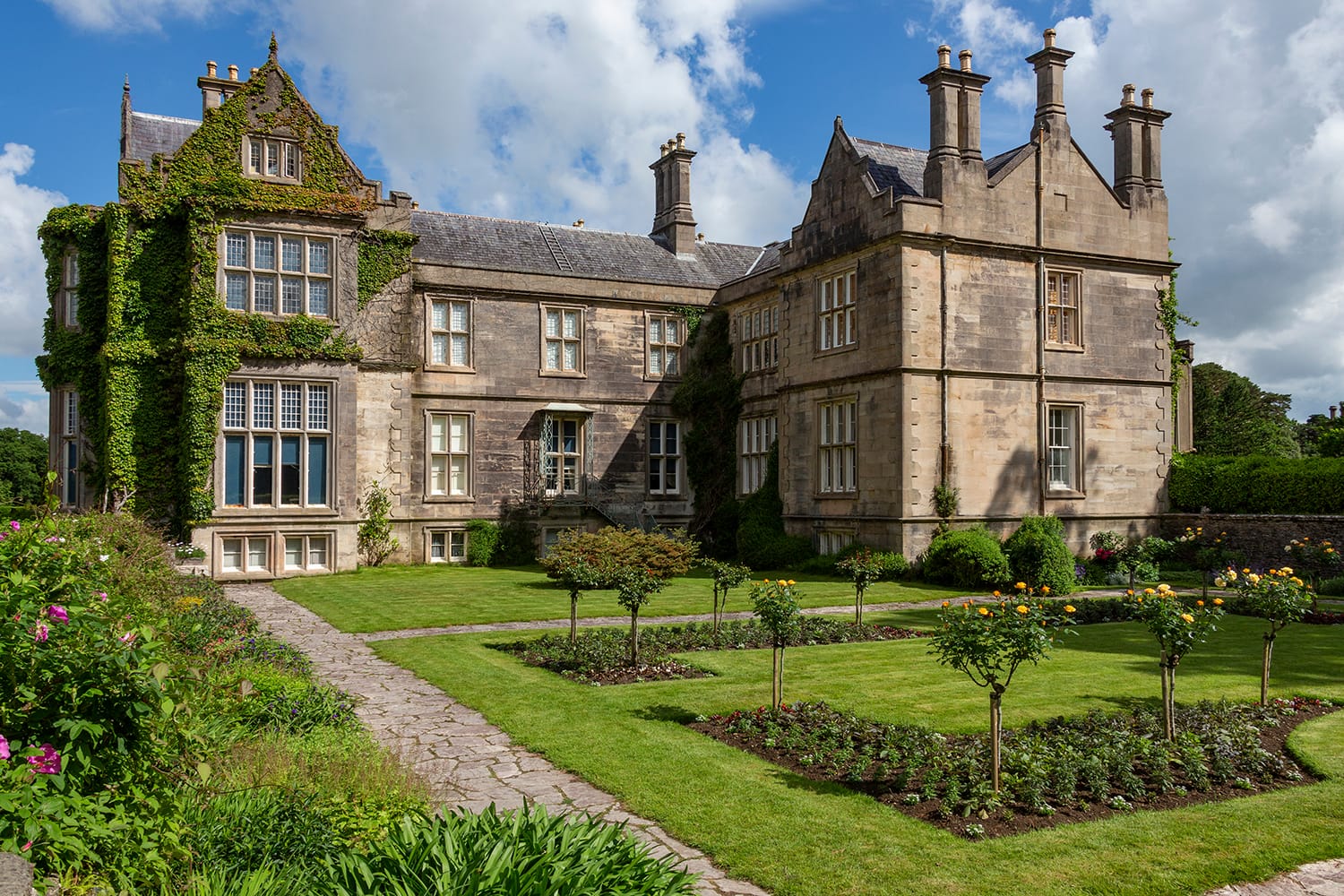 Muckross House - located on Muckross Peninsula between Muckross Lake and Lough Leane, two of the lakes of Killarney, 6km from Killarney in County Kerry, Ireland.