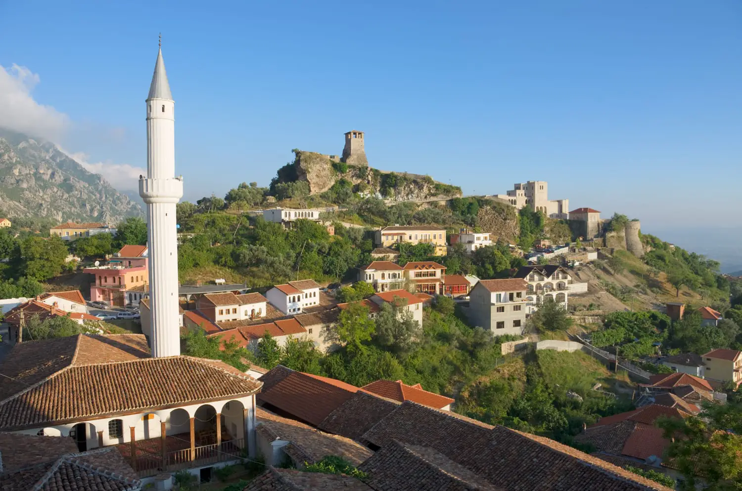 view of the minaret of the Kruja village and the Clock Tower and National Museum in Skanderbeg Castle, Albania