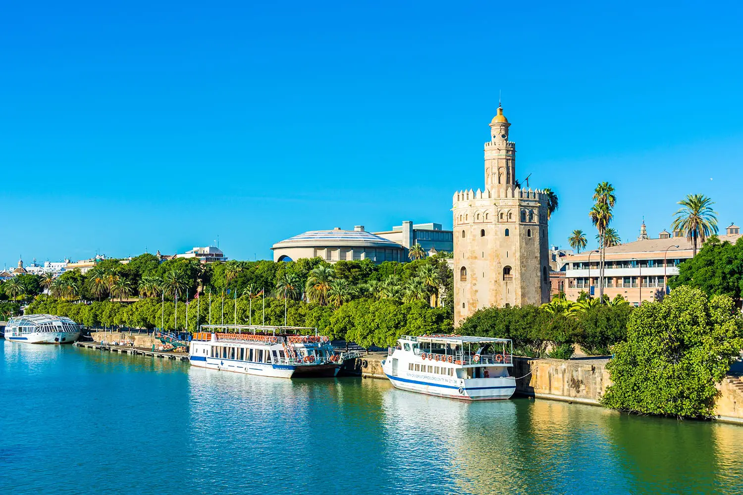 The Torre del Oro in Seville is an albarrana tower located on the left bank of the Guadalquivir River. It houses the Naval Museum of Seville, Spain