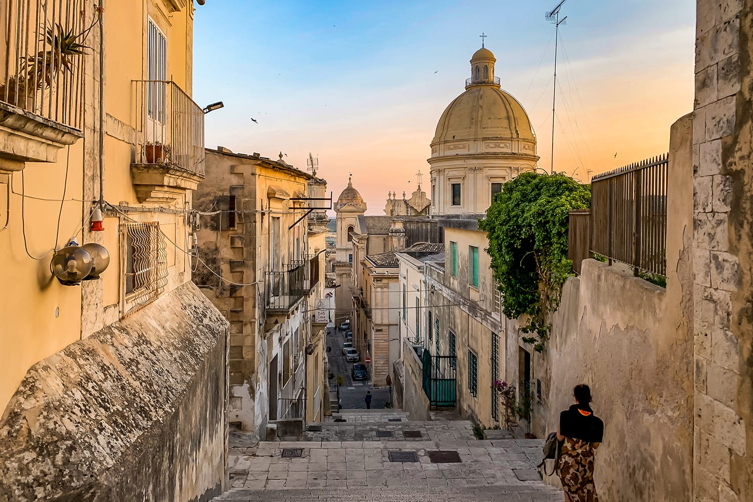 View of beautiful and typical streets and stairs in the baroque town of Noto in the province of Syracuse in Sicily, Italy