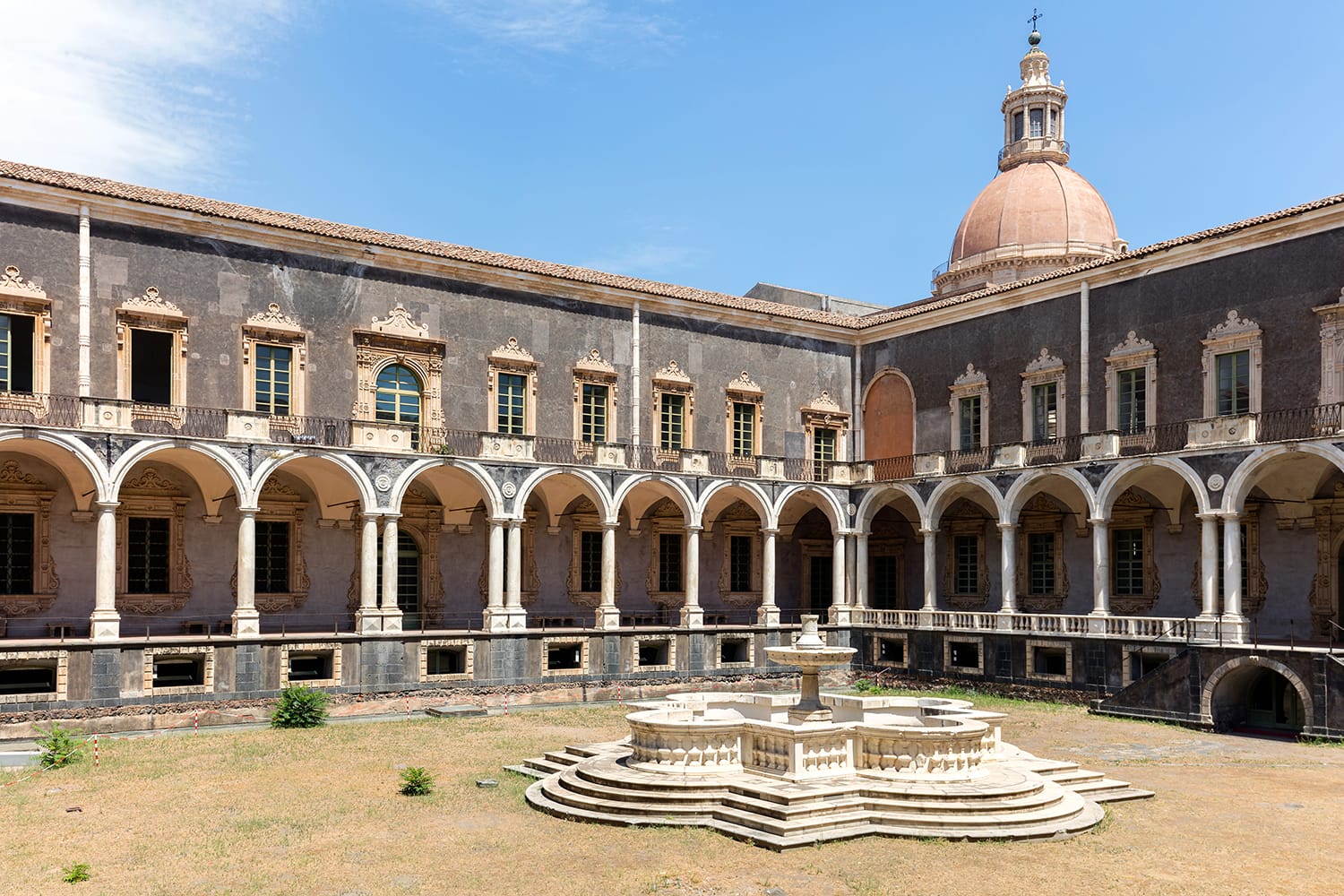 Cloister of the Benedictine Monastery of San Nicolo l'Arena in Catania, Sicily, Italy, a jewel of the late Sicilian Baroque style.