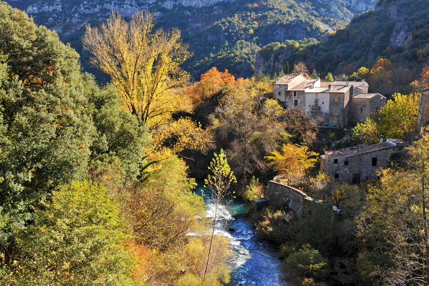 Typical village in Cevennes Mountains with river