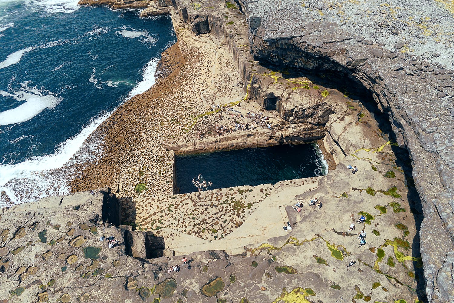 Aerial drone view on famous Poll na bPéist - The Wormhole, Inishmore, Aran islands, county Galway, Ireland.