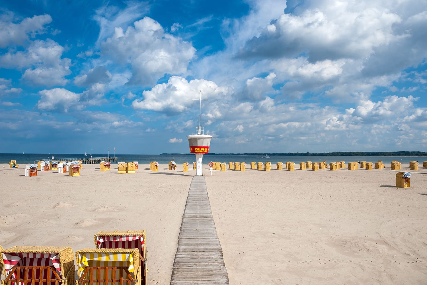 Beach with lifeguard tower of the DLRG in Travemuende at the Baltic Sea